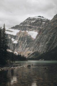 An image of a lake at the base of a mountain in the Canadian Rockies. The suggestion here is there is a Canadian alternative. 